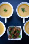 butternut squash soup in 4 espresso cups with bowl of croutons p