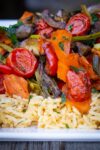 Roasted Veggies on top of Spiced Rice on a plate p