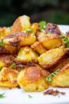 roasted potatoes piled on plate p1