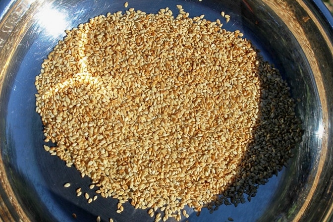 sesame seeds toasting in pan