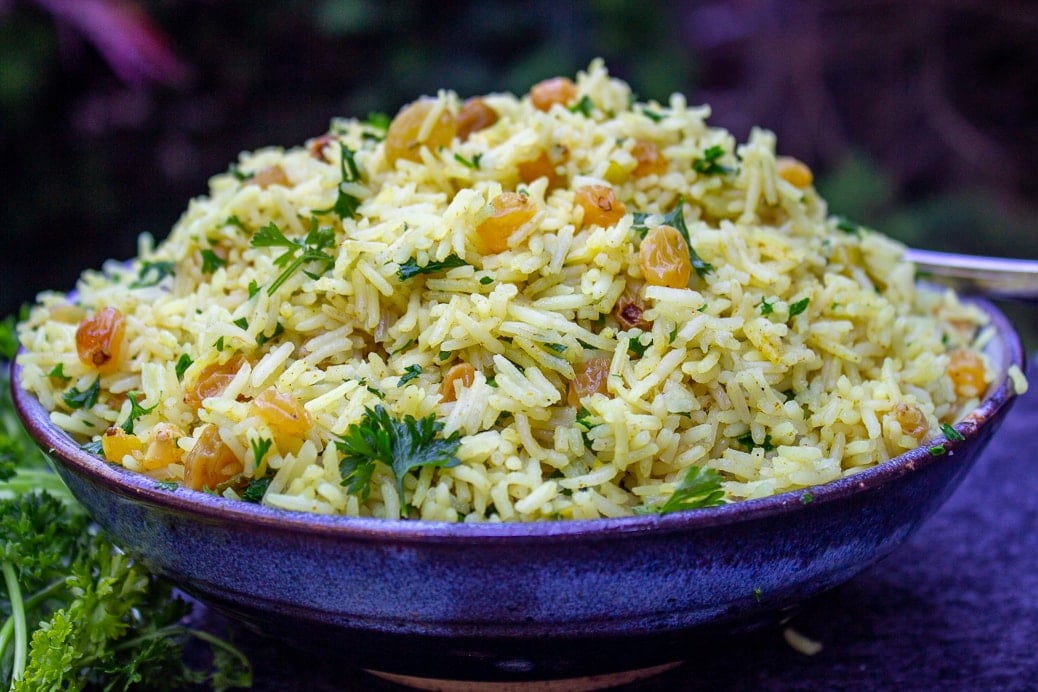 Curried Rice with Raisins in serving bowl