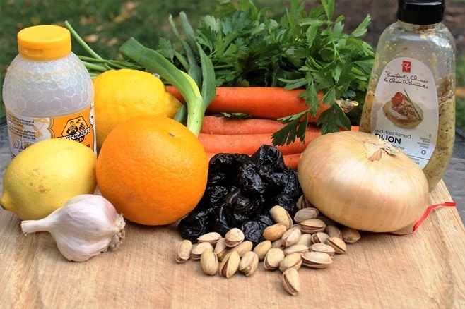 Chicken. lemon, orange, honey, pistachios, carrots, parsley, Dijon, green onions, prunes, garlic, onion, Pistachios