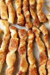 cheese twists lying in pan in a row p3