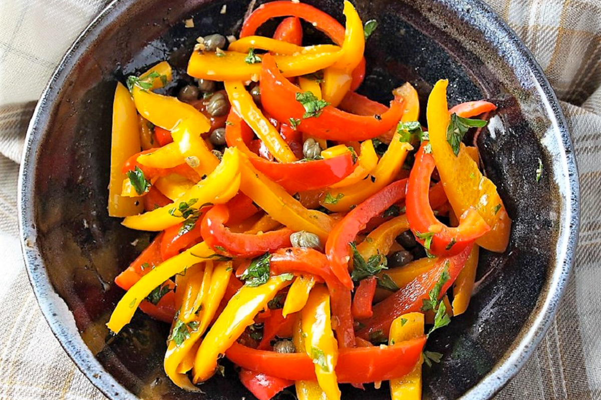 sauteed peppers with caper vinaigrette in bowl