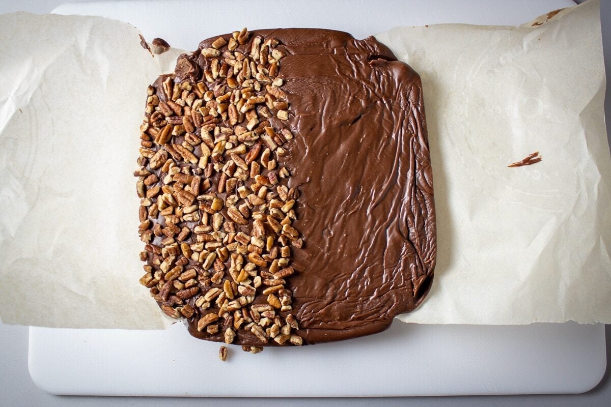 chilled fudge lifted onto cutting board