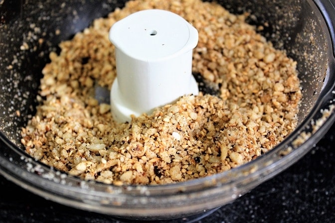 seeds, nuts, seasoning processed in food processor bowl