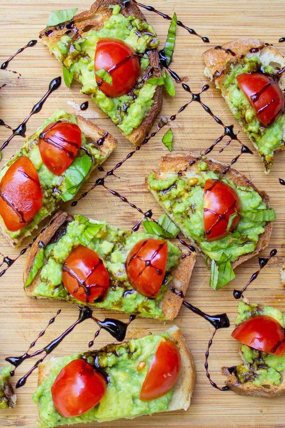 appetizers with avocado on crostini drizzled with balsamic reduction p