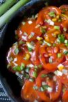 Marinated Tomato Salad in a black bowl