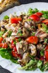 grilled sesame lime chicken quinoa salad on serving plate p