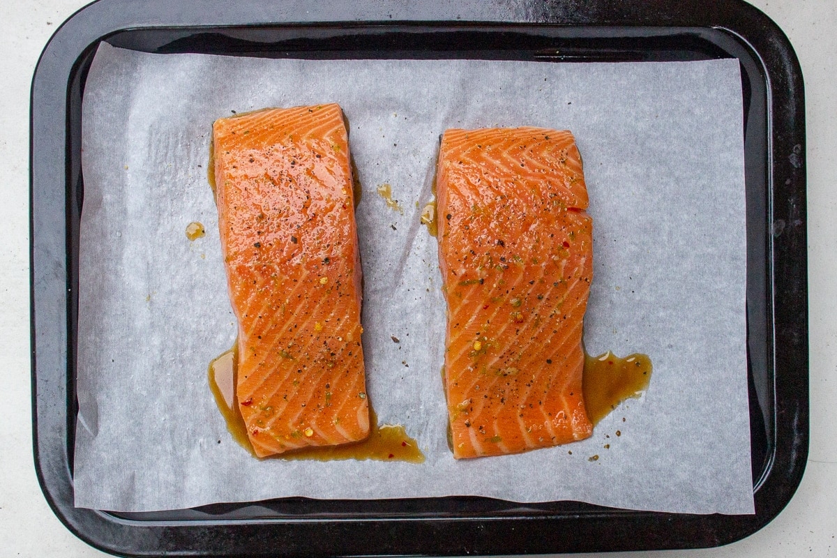 marinated salmon filets on pan