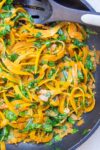 sauteed butternut squash noodles with spinach in pan p