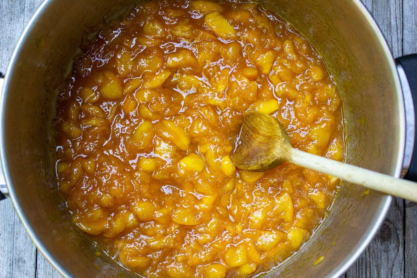 peach marmalade cooked in pot