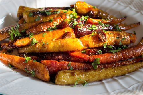 Roasted Glazed Carrot Tzimmes in serving dish