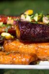 close up of Roasted Glazed Carrot Tzimmes on serving plate p