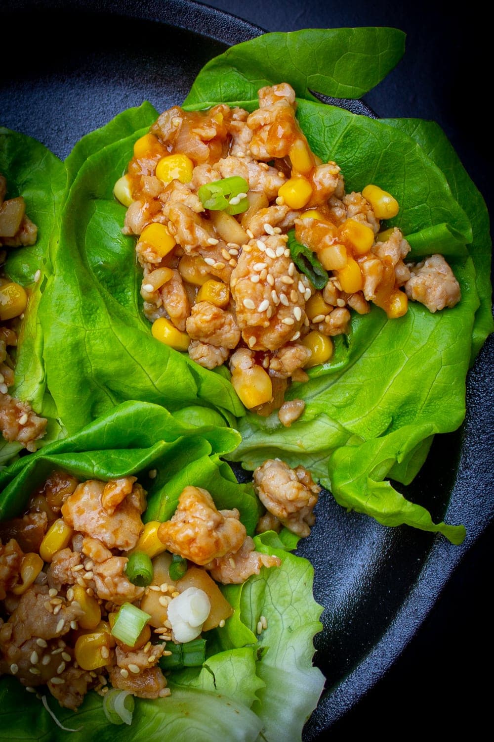 3 PF Chang's chicken lettuce wraps on plate p