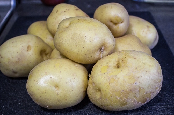 a pile of Yukon gold potatoes