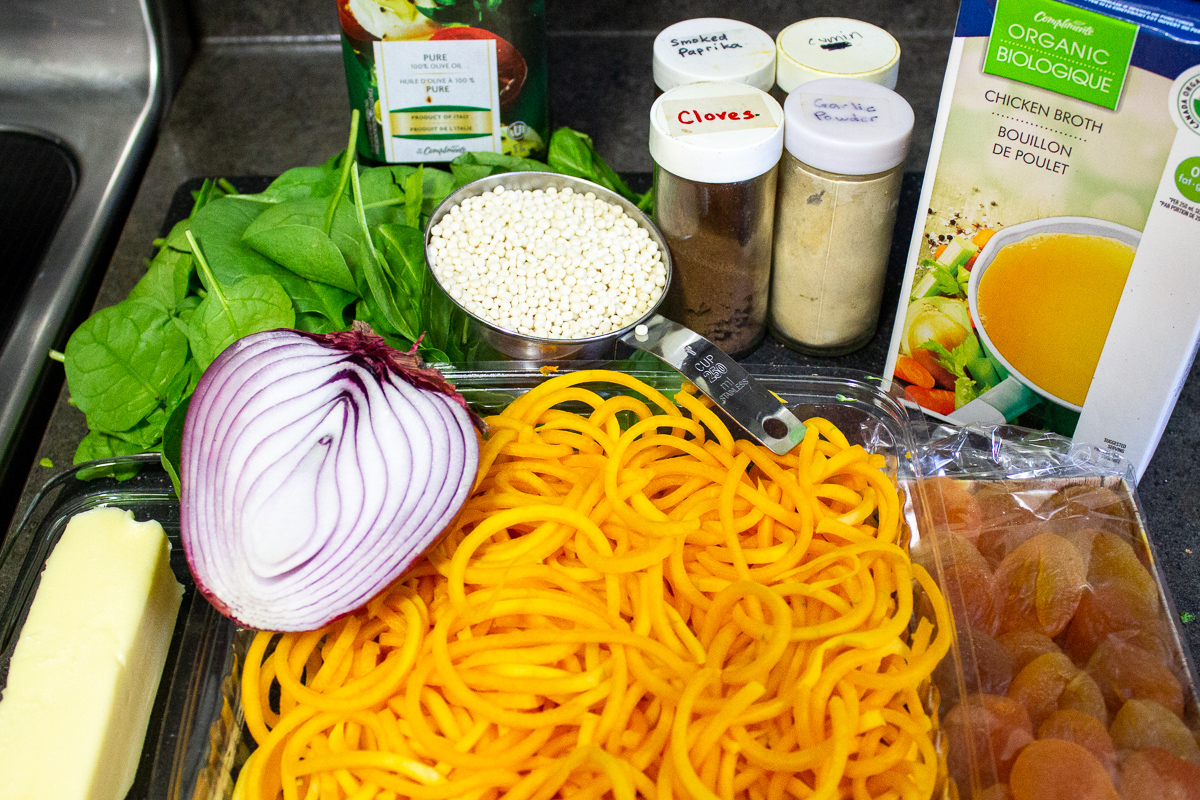 pearl couscous, spiralized butternut squash, spinach, apricots, butter, seasonings, onion, chicken broth, olive oil
