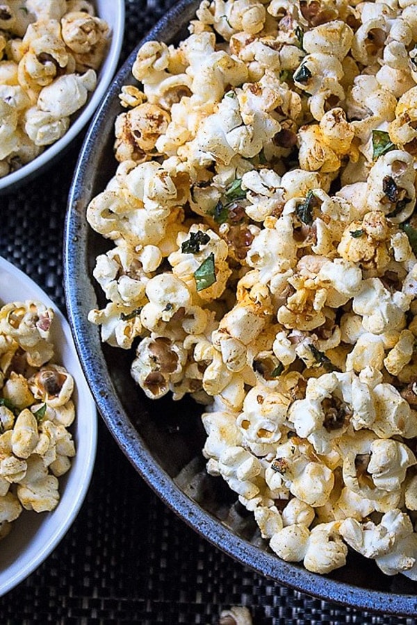 Spiced Herb Popcorn in 3 bowls on placemat