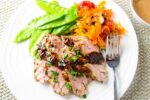 sliced Pork Tenderloin with Balsamic Maple Glaze and vegetables on plate f