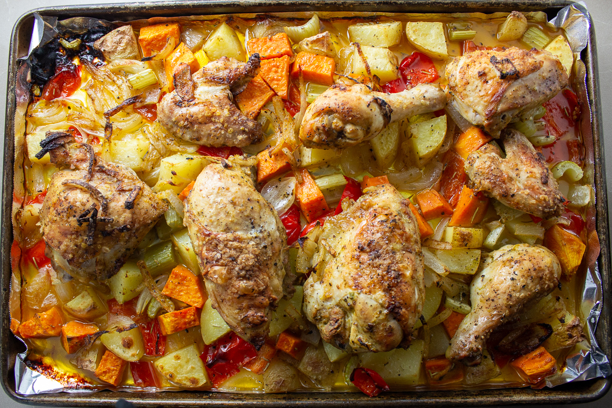 roasted chicken and vegetables on pan