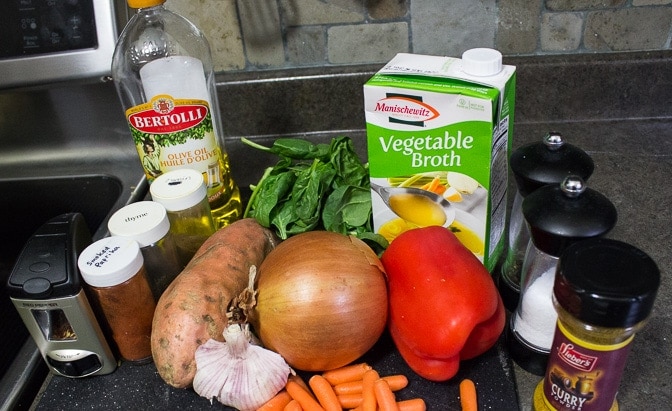 sweet potato, pepper, onion, spinach, broth, carrots, garlic, oil, seasonings