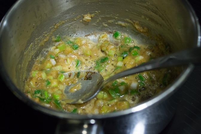 roux for gravy with butter, flour, green onion in pot