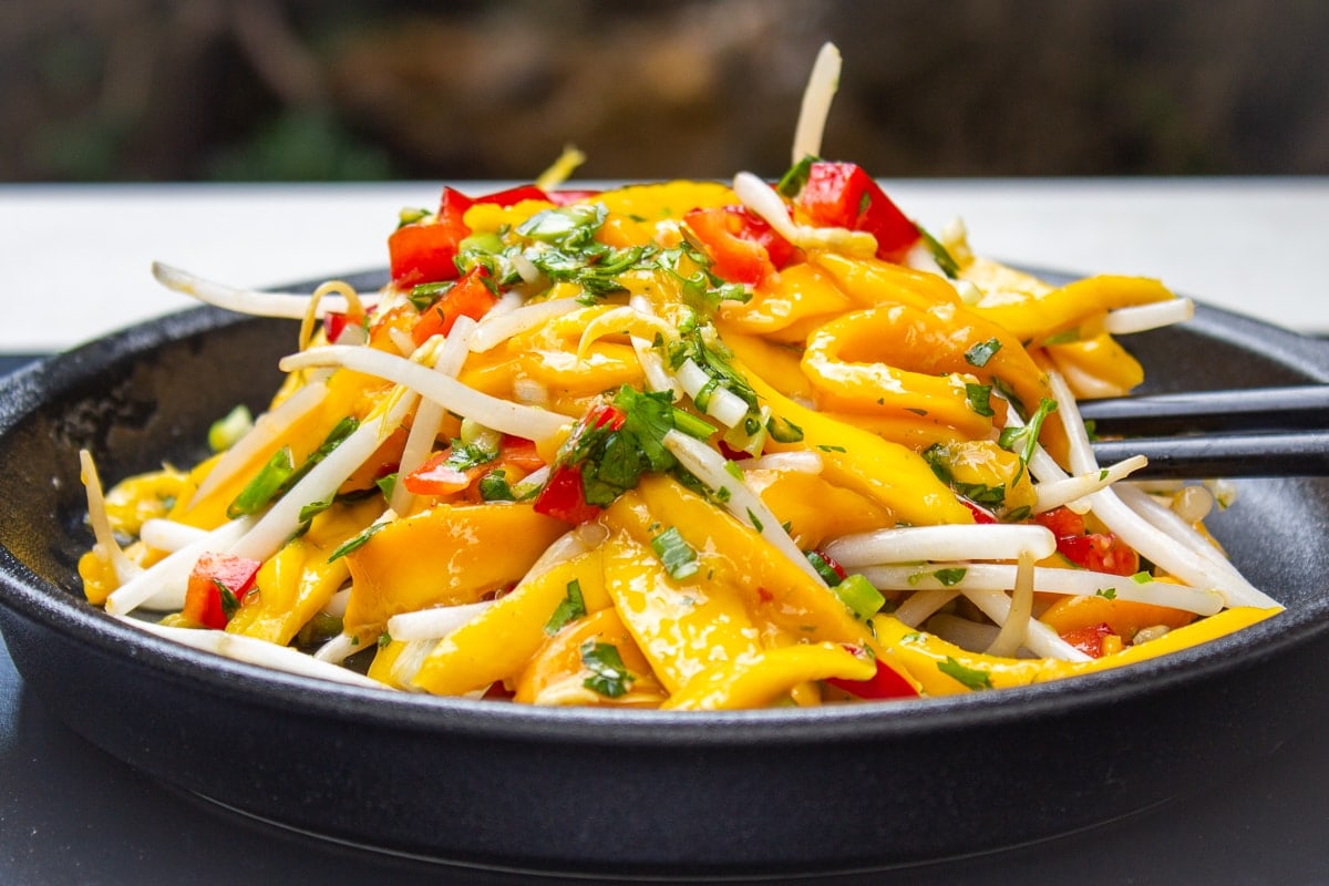fresh mango salad with crunch bean sprouts. Sweet, tangy and spicy.