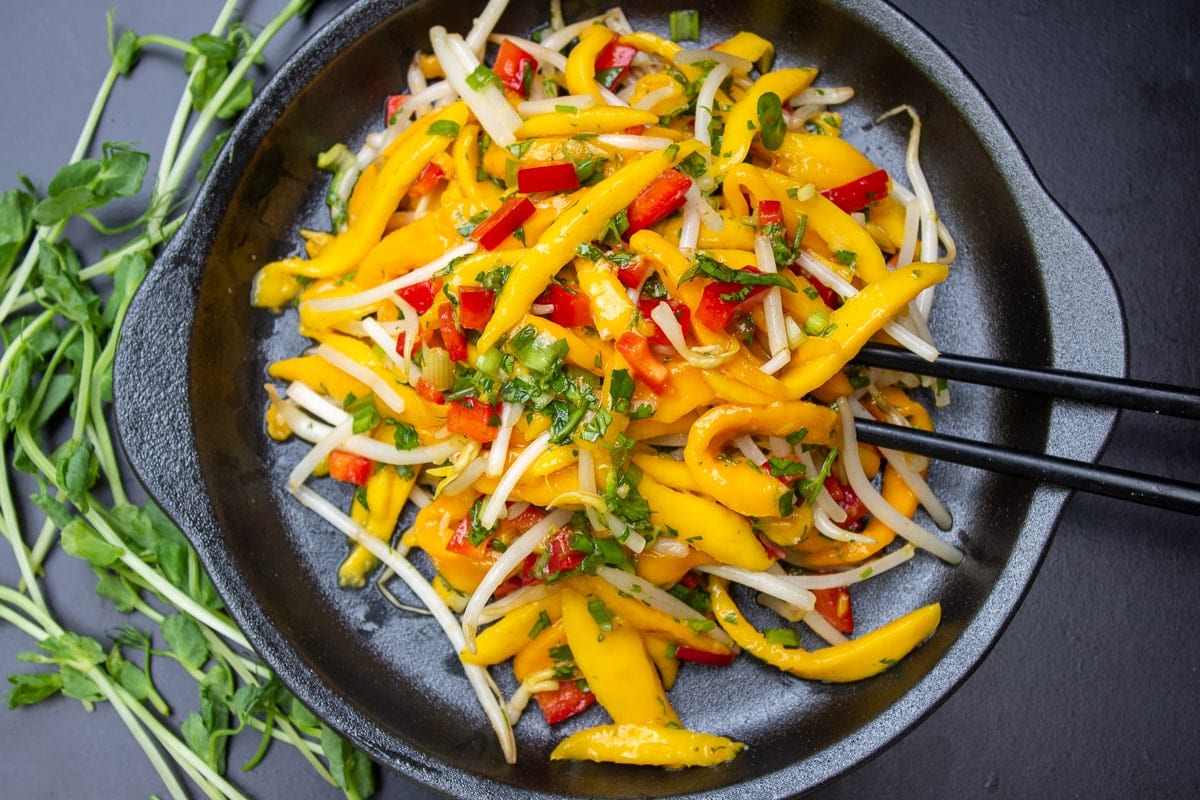 Thai mango salad in bowl 1