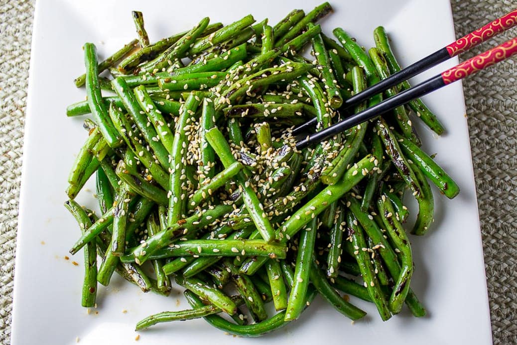 Chinese Stir-Fry Green Beans on plate with sesame seed garnish