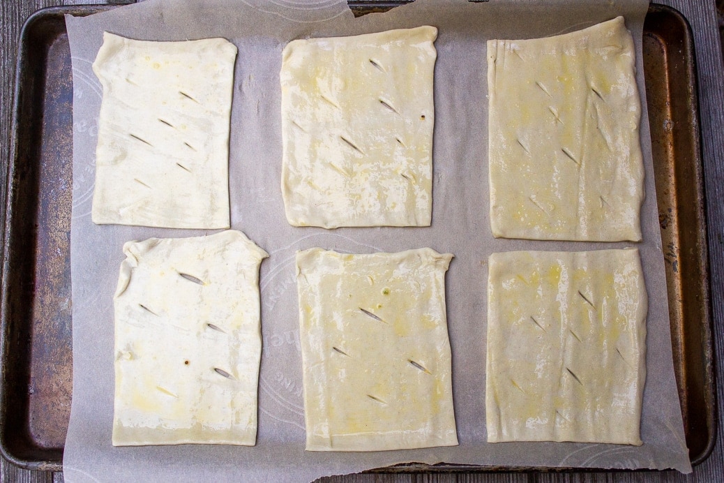 puff pastry dough cut into 6 rectangles and brushed with eggwash