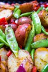grilled veggies and potatoes in grill basket close up p3