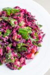 Beet, Spinach and Quinoa Salad on white plate p