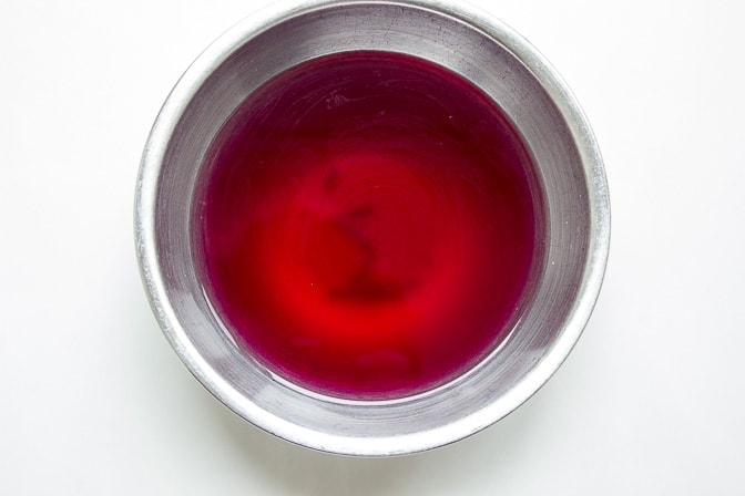 bowl with water and beet juice