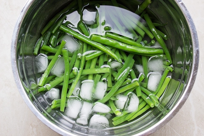 Green Beans in ice water in a bowl