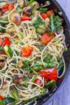 vegetable pasta with wine sauce in pan p1