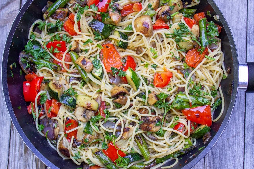 vegetable pasta with wine sauce in pan