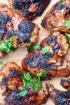 Grilled Chili Lime Chicken Wings on cutting board p2