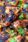Grilled Chili Lime Chicken Wings on cutting board p1