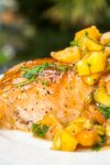 maple salmon fillet with peach salsa on plate p