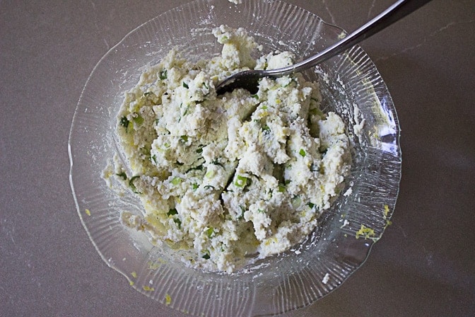 mixture of Lemon Ricotta green onions is bowl