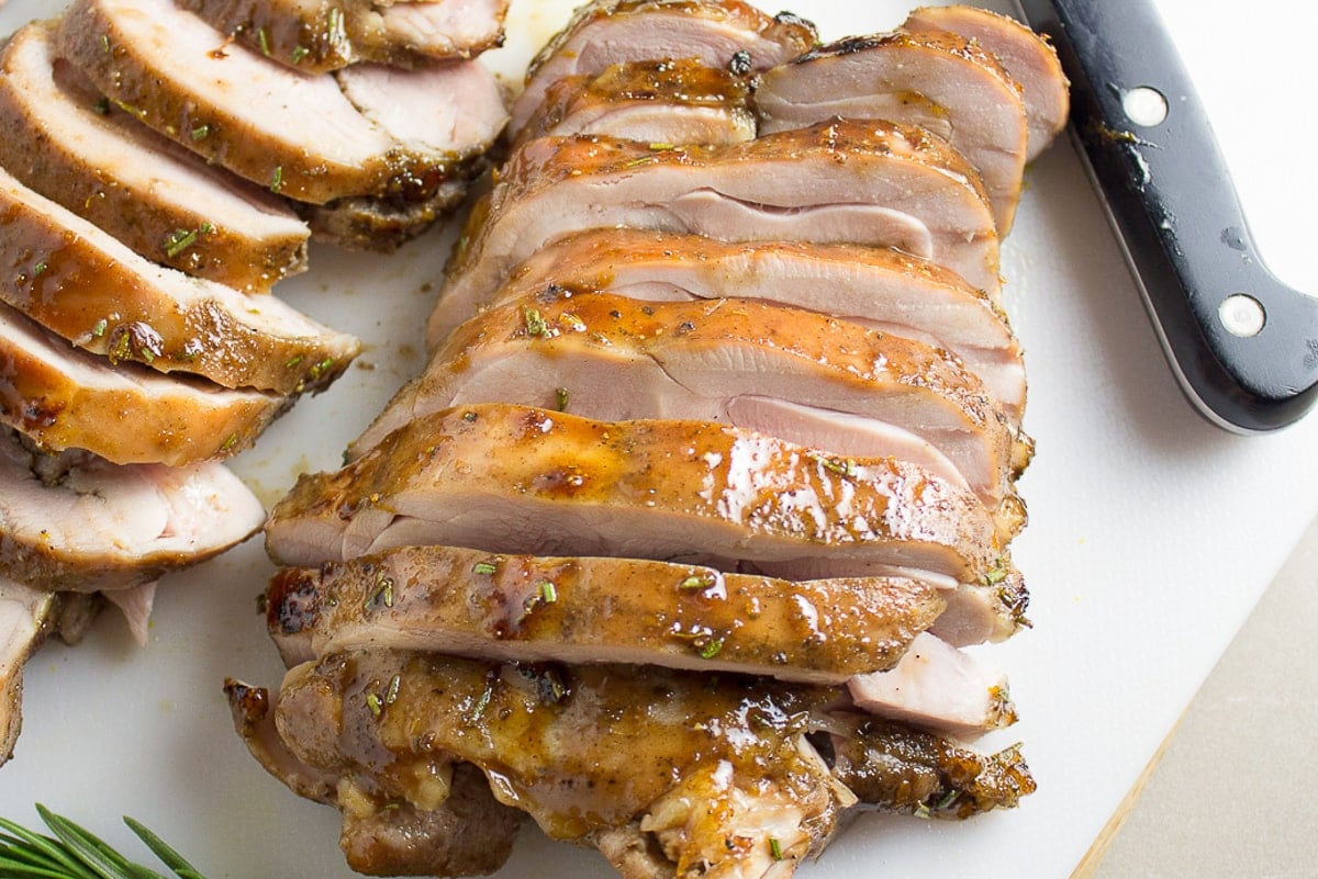 sliced sous vide turkey thighs on cutting board 1