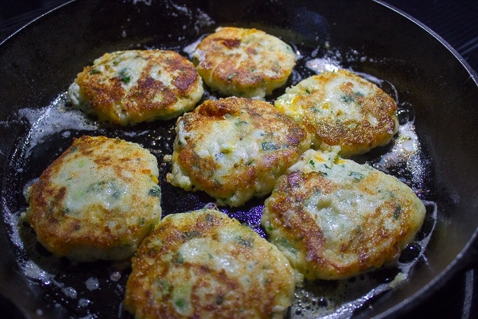 Mashed Potato Pancakes frying in skillet