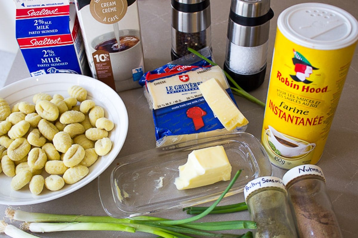 gnocchi, butter, cheeses, milk, cream, seasonings, flour, green onions