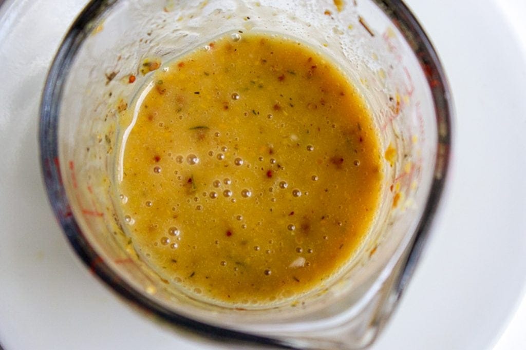 maple mustard sauce in measuring cup