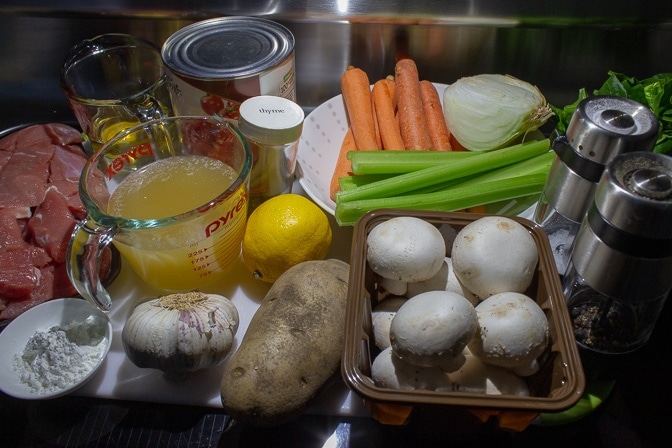 veal, broth, garlic, mushrooms, carrots, celery, onions, lemon, oil, thyme