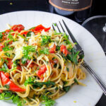 vegetarian pasta on plate with wine