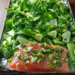 Baby Bok Choy Broccoli and salmon on pan