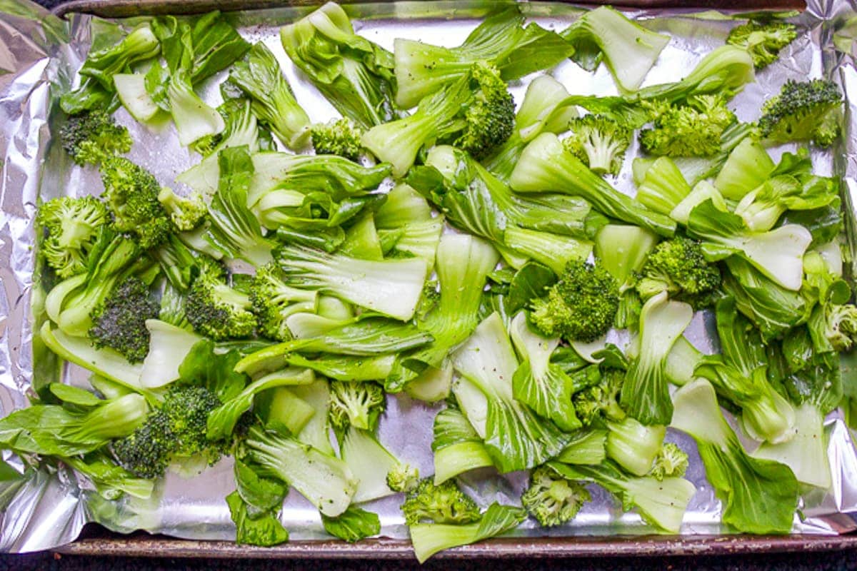 seasoned bok choy on lined pan