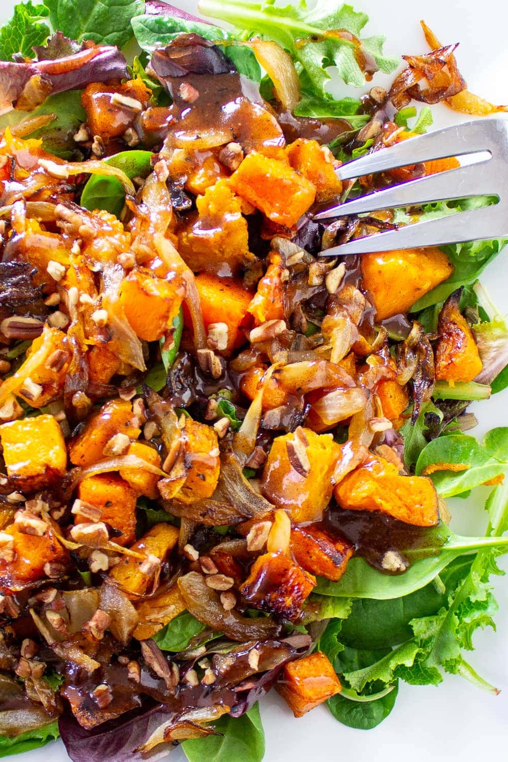 butternut squash salad with cinnamon dressing on plate p