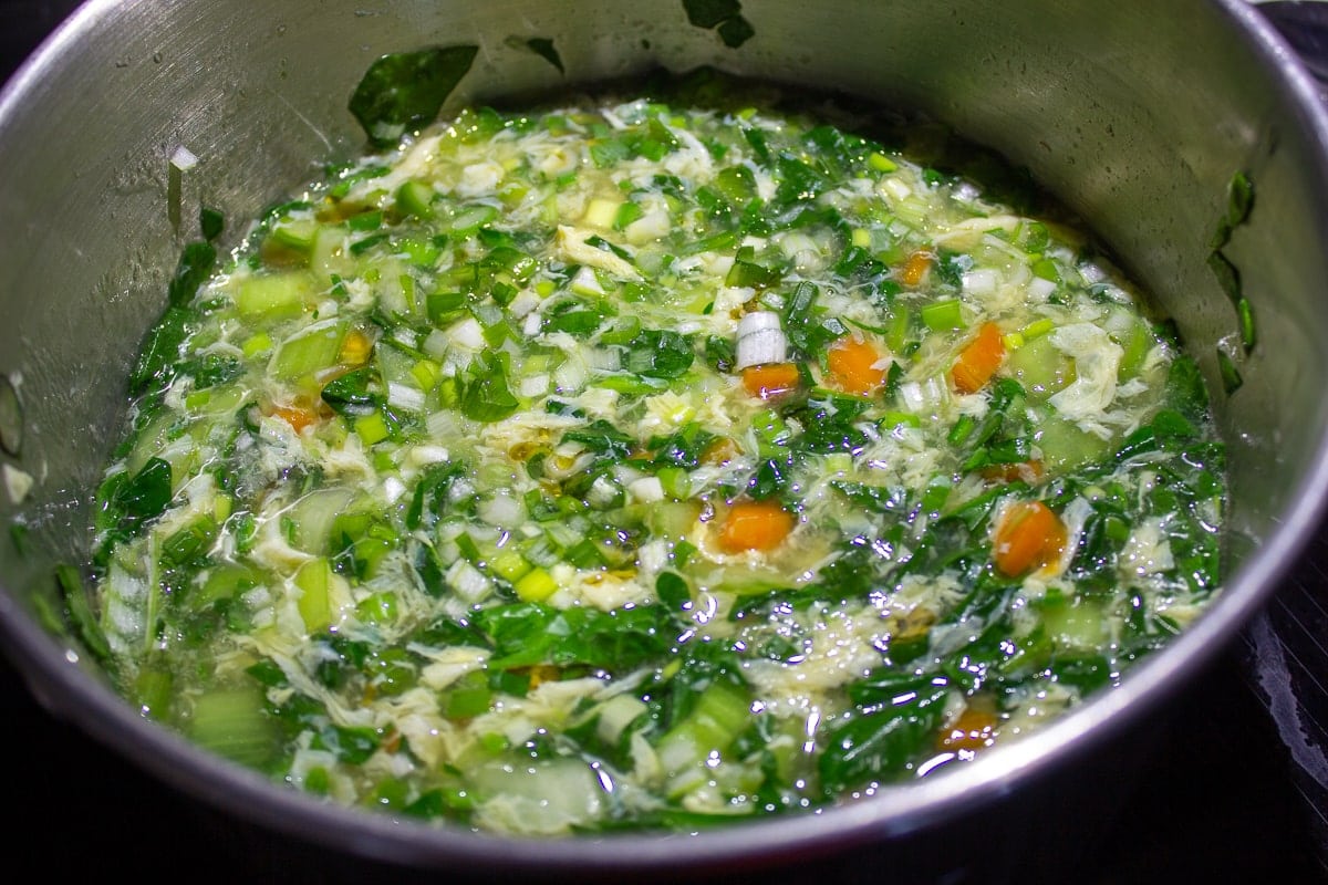 vegetable egg drop soup in pot ready to serve